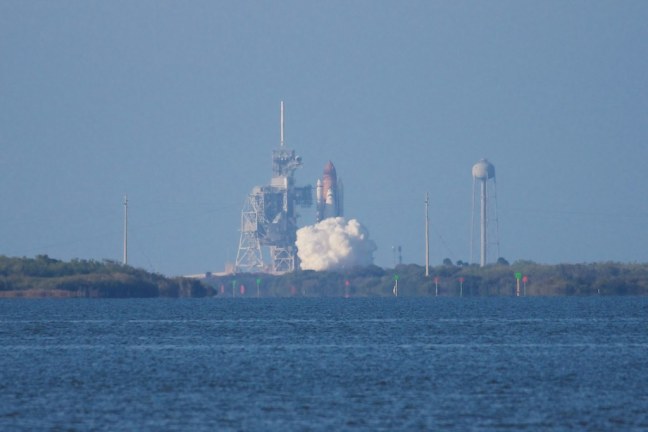 STS-133 Discovery liftoff from Launch Pad 39A