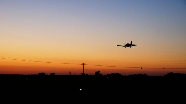 SportCruiser landing at Cushing Field (0C8) as sun sets